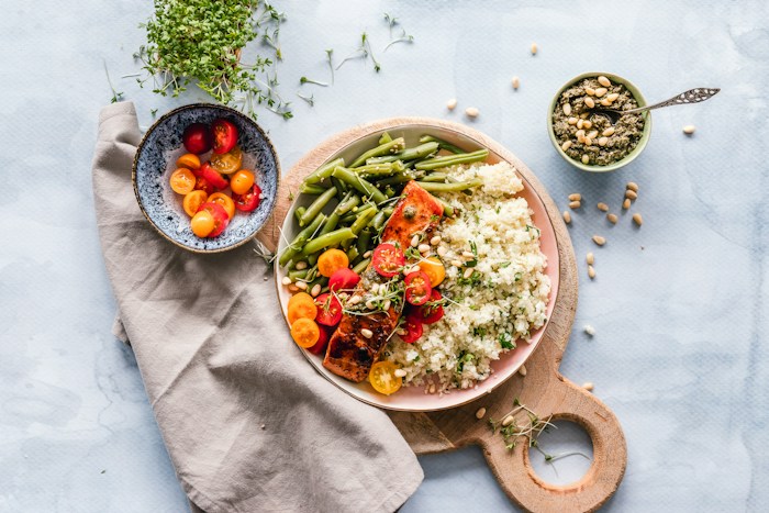 A prepared rice meal with colourful vegetables